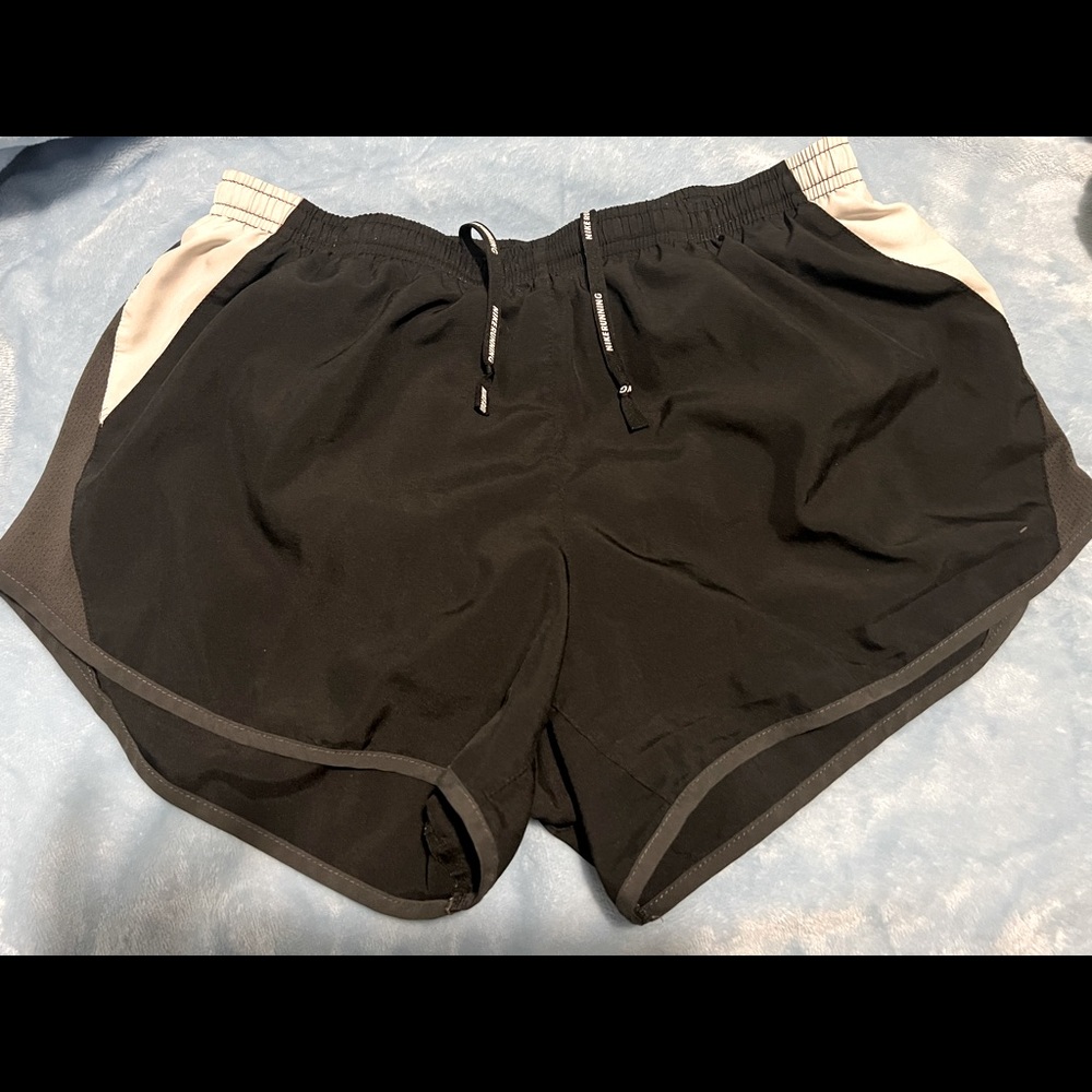 Black Nike running shorts